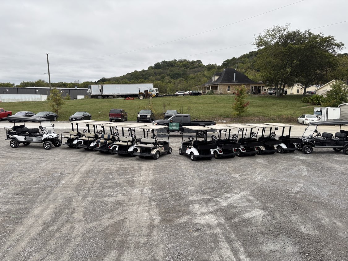 A lineup of used golf carts for sale at Nashville Golf Cart Sales